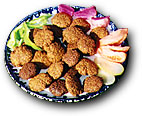 plate of falafel with fixins